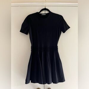 Alexander MQueen mini black dress.